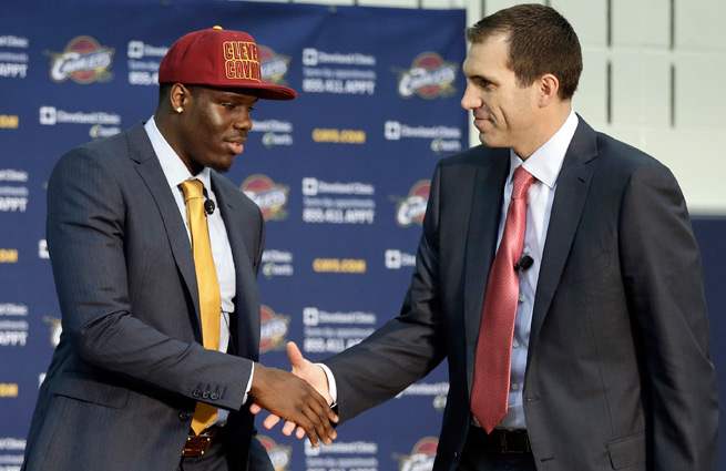 Ex-Cavs GM Chris Grant (right) was put in the undesirable position of having top picks in weak drafts.